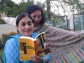 ladies from both sides of the border enjoying my book in the club gdn (2)